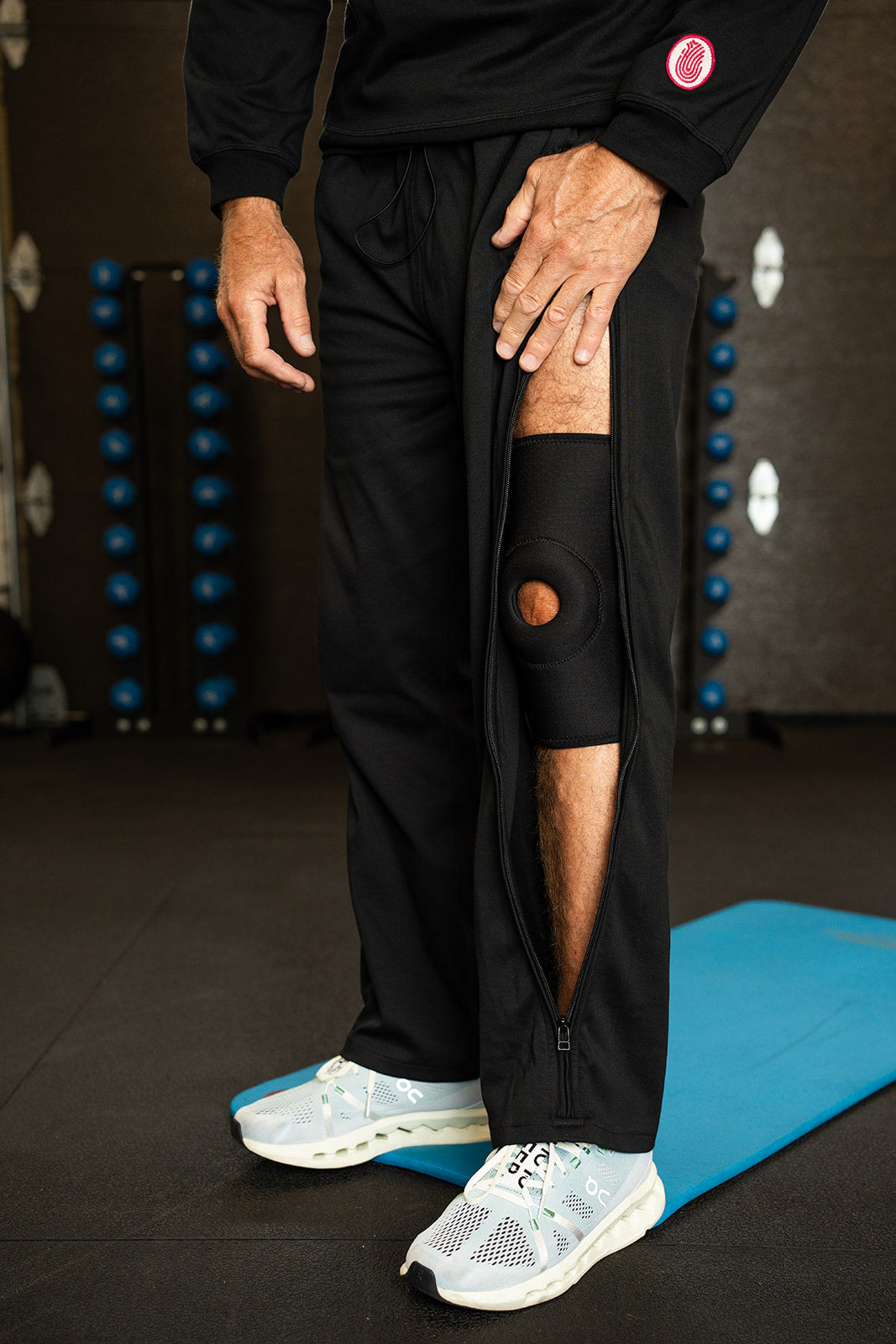 Adaptt adaptive apparel with zip leg opening for individuals with limited mobility.